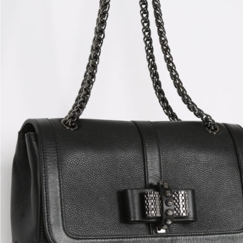 Christian Louboutin
Sweet Charity leather crossbody bag